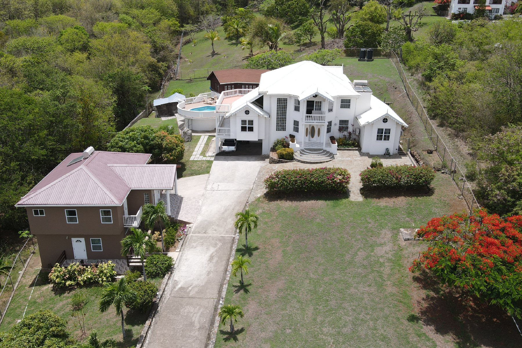 4-Bed Home with Cottage & Income-Generating Duplex